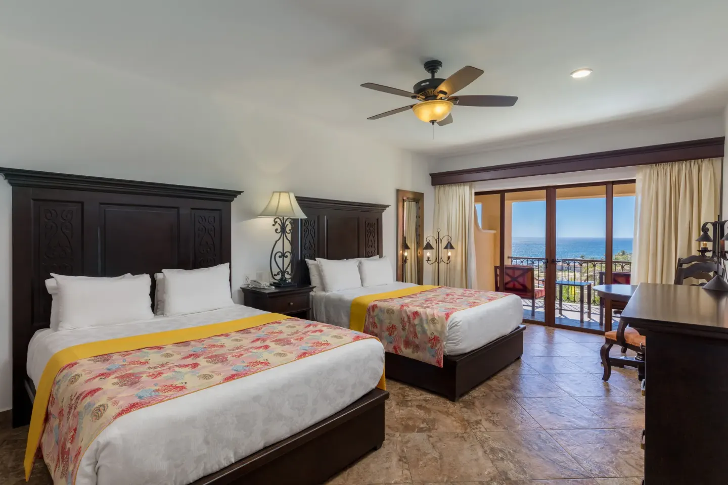Studio ocean view room with two beds and balcony at El Encanto at Hacienda Encantada.