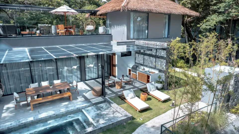 Private villa terrace with plunge pool and sun loungers at El Mangroove Papagayo