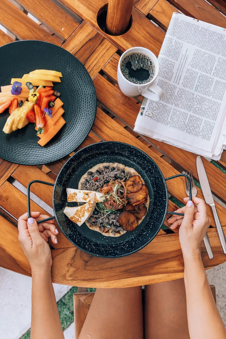 Breakfast skillet with coffee and fresh fruit at El Mangroove Papagayo