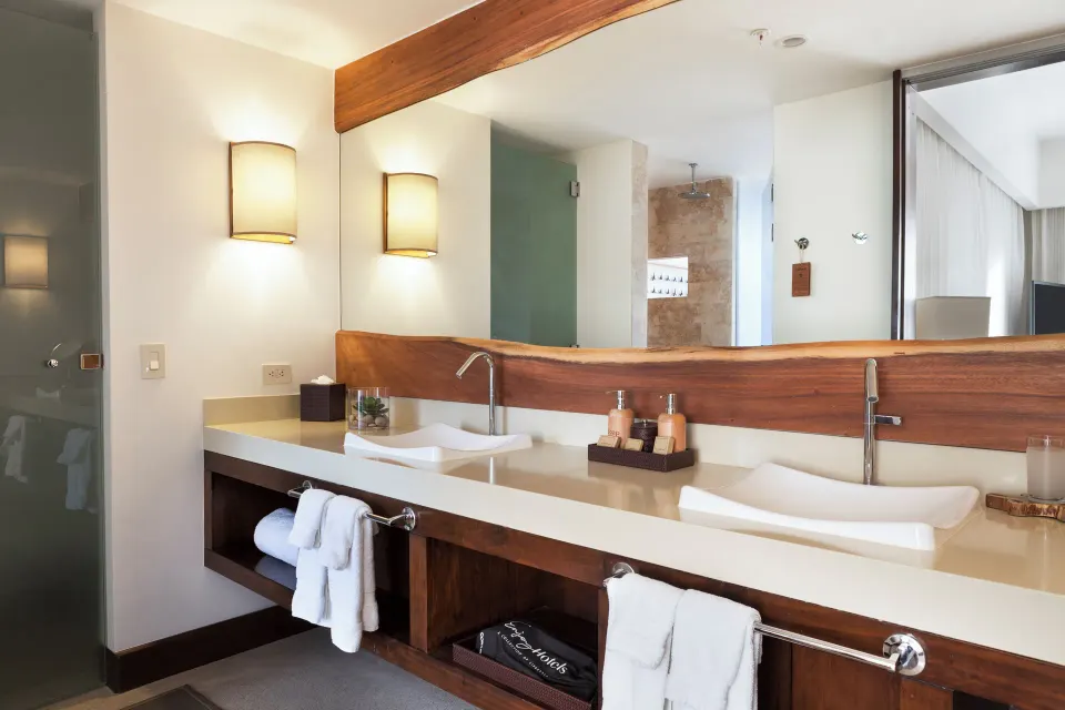Double sink vanity in the suite bathroom at El Mangroove Papagayo