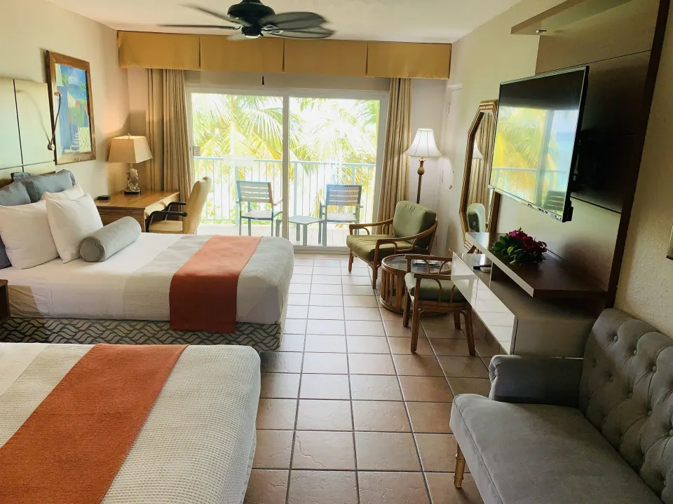 Two-bed Beachfront Premium room with seating and balcony at Emerald Beach Resort.