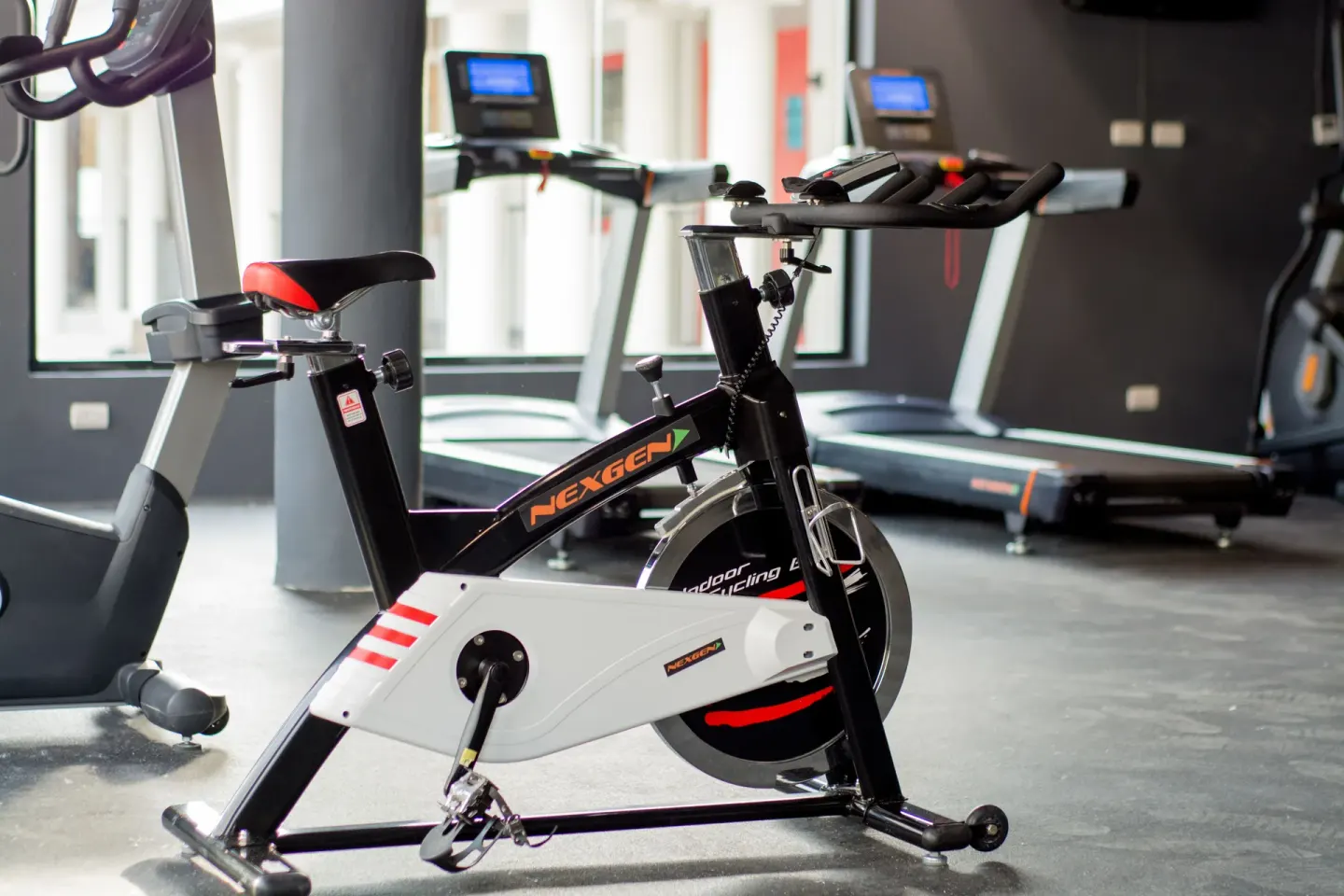 Stationary bike and treadmills in the fitness room at Emotions by Hodelpa Puerto Plata.