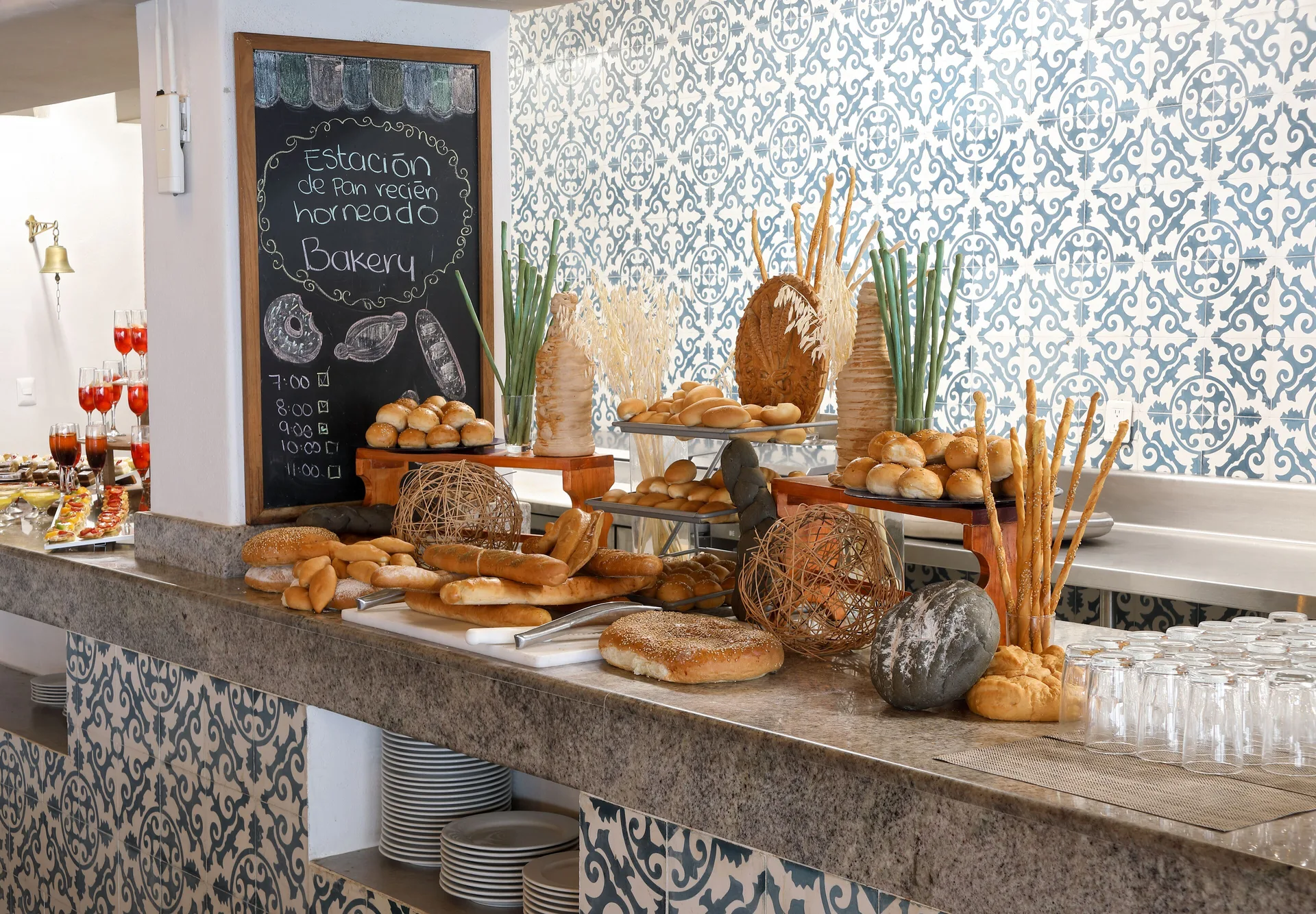Bakery buffet with breads and pastries on display at Emporio Ixtapa.