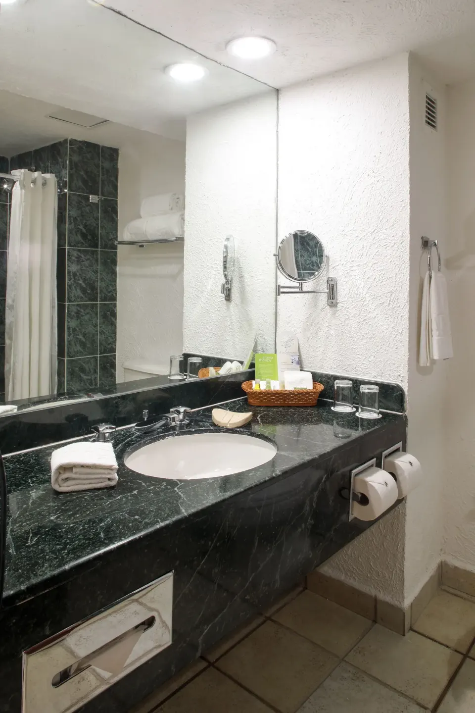 Superior Mountain View bathroom vanity with sink and mirror at Emporio Ixtapa.