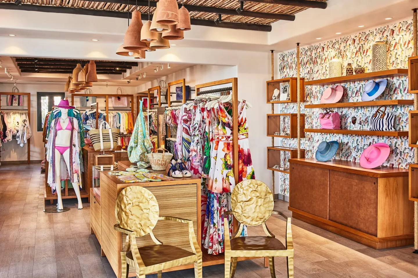 Resort boutique with colorful clothing, hats, and accessories at Esperanza.