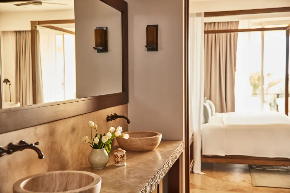 Guest room vanity and canopy bed in Room, 3 Bedrooms, Ocean View at Esperanza.