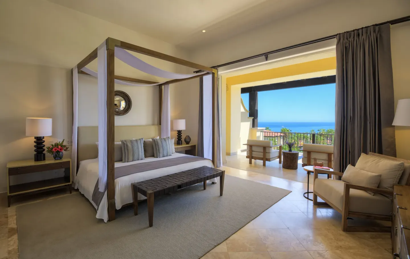 Canopy bed guest room with terrace and ocean view at Esperanza.