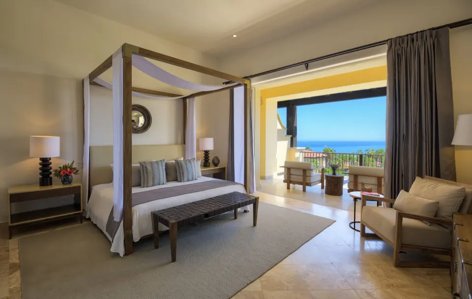 Canopy bed guest room with terrace and ocean view at Esperanza.