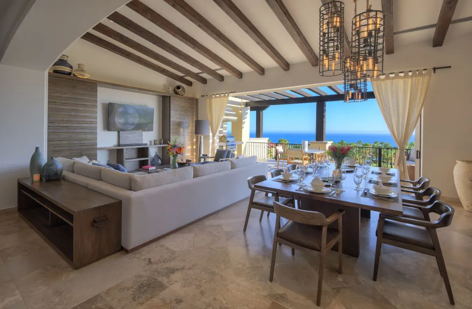 Living and dining area with terrace and ocean view at Esperanza.
