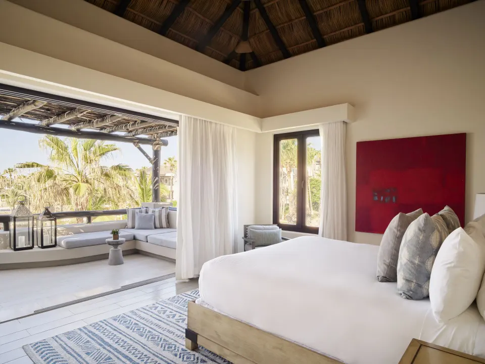Studio Ocean View king bed and terrace seating at Esperanza.