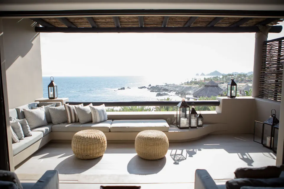 Penthouse Spa Suite terrace seating with ocean and coastline view at Esperanza.
