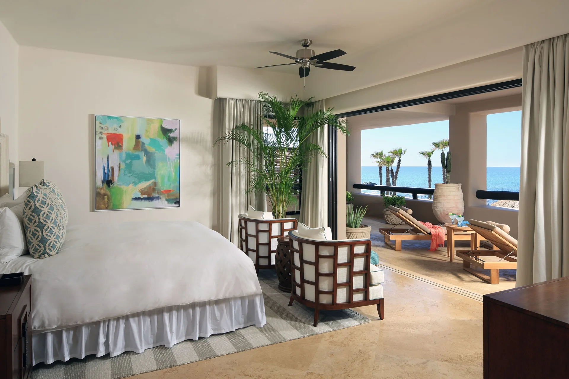Oceanview 1 Bedroom Terrace Spa Suite at Esperanza with king bed, daybed, private terrace, and panoramic Sea of Cortez views in Cabo San Lucas.