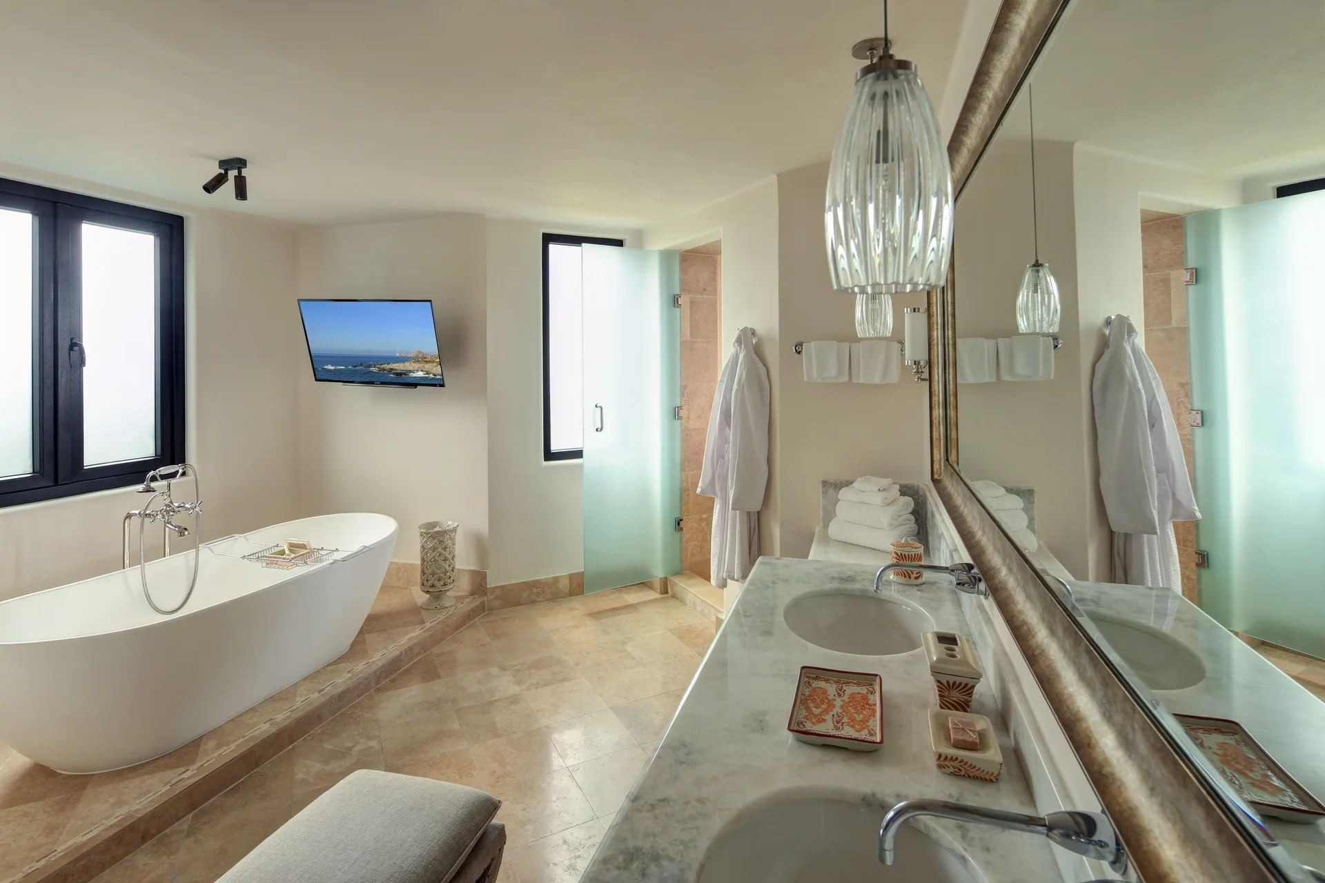 Oceanfront villa bathroom with freestanding tub and double vanity at Esperanza.