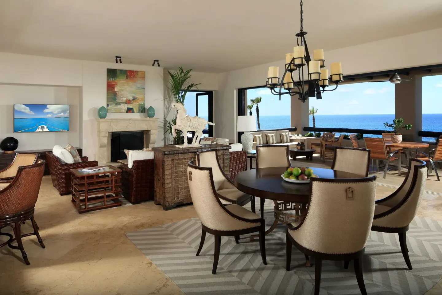 Oceanfront villa living and dining room with terrace views at Esperanza.