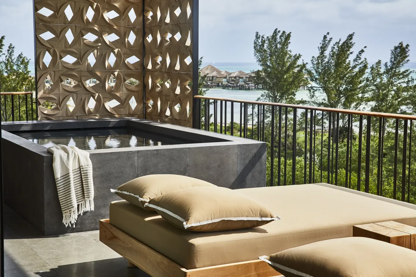 Ocean Studio terrace with plunge pool and daybed at Etéreo, Auberge Collection.