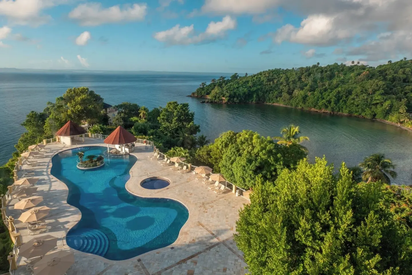 Aerial view of the pool terrace and bay coastline at Eurostars Grand Cayacoa.