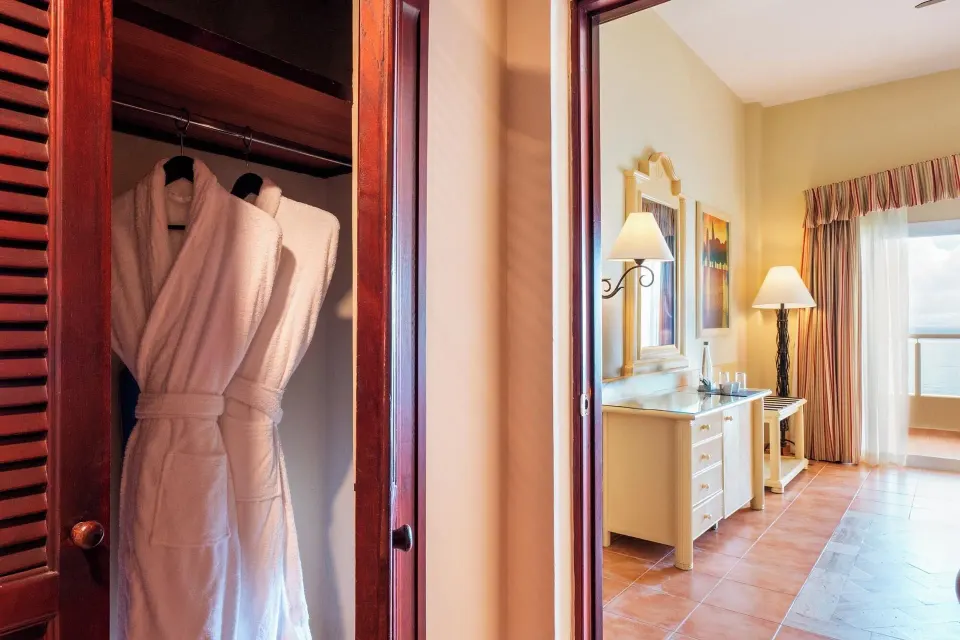Deluxe Room Sea View closet with robes at Eurostars Grand Cayacoa.