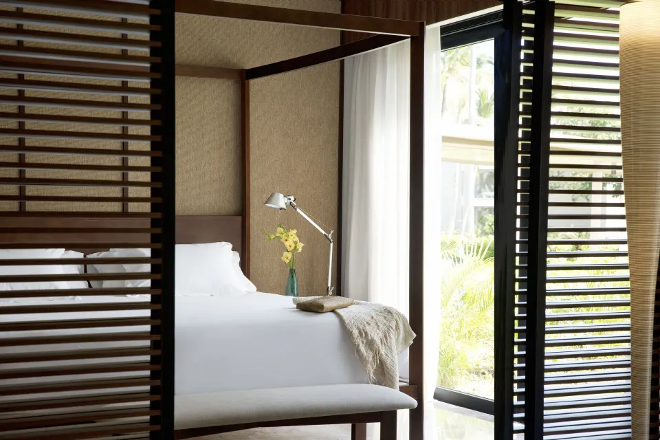 Excellence El Carmen bed with louvered screens at Excellence El Carmen.