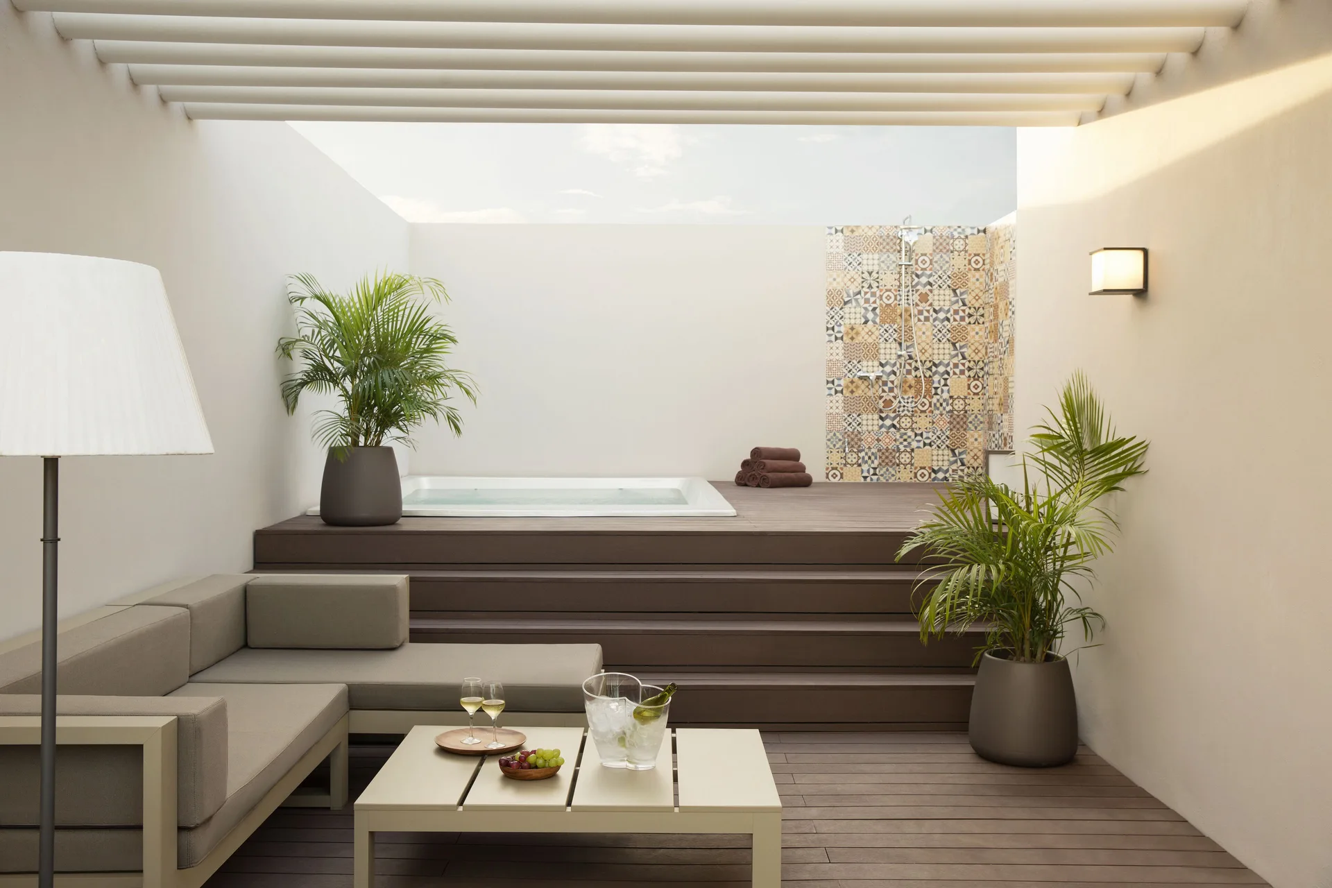 Rooftop terrace plunge pool and lounge seating at Excellence El Carmen.