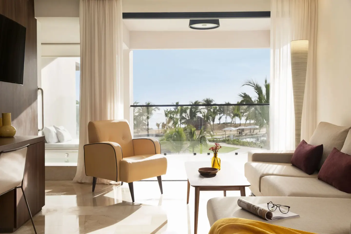 Junior Suite Ocean View sitting area and balcony at Excellence El Carmen.