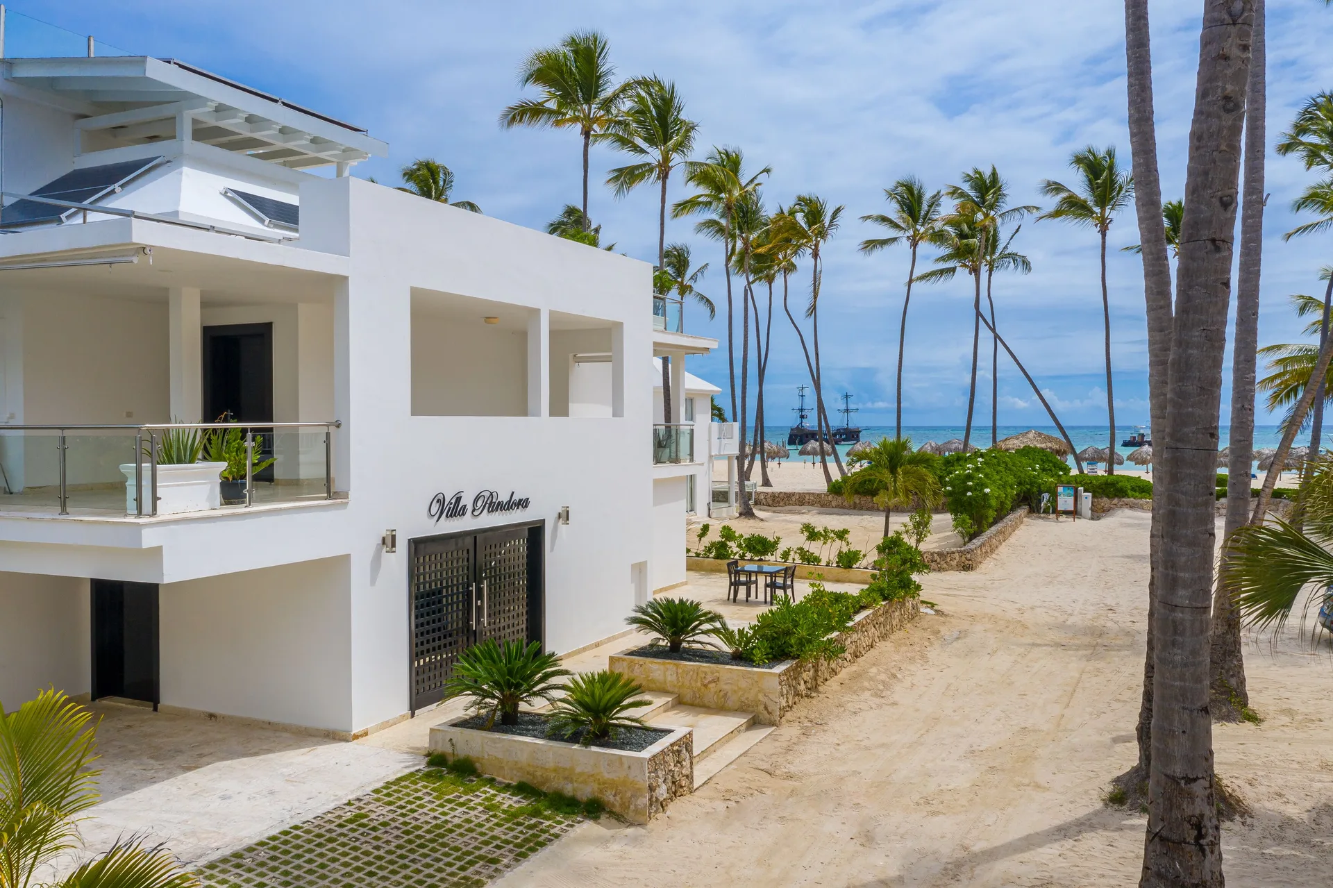 Luxury beachfront villa in Los Corales with oceanfront setting private outdoor space and tropical style