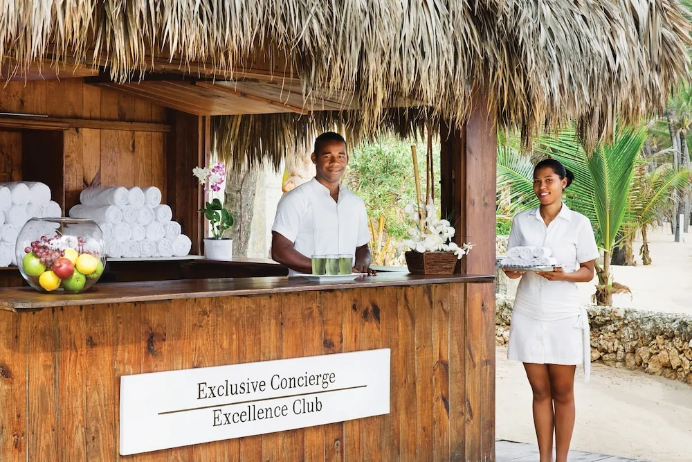 Beach concierge hut with staff, towels and fruit at Excellence Punta Cana.