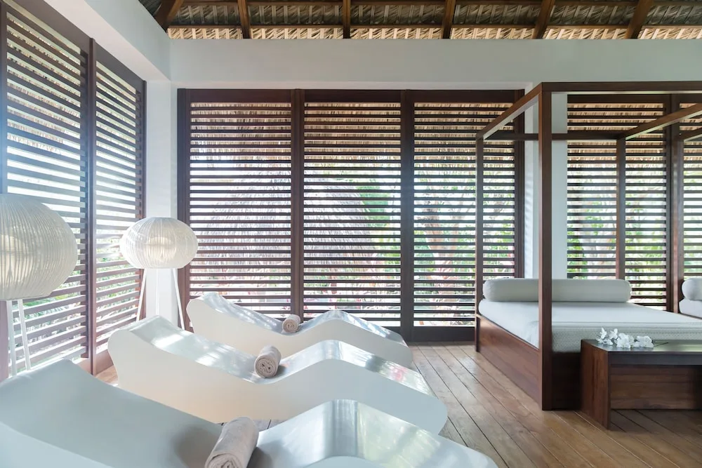 Spa relaxation room with sculpted loungers at Excellence Punta Cana.