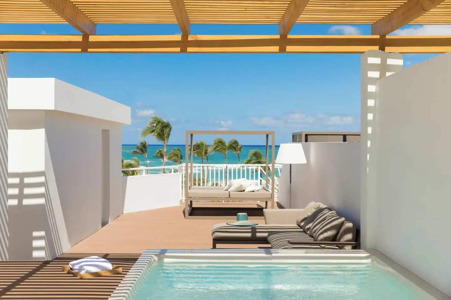 Private terrace plunge pool and ocean view at Excellence Punta Cana.