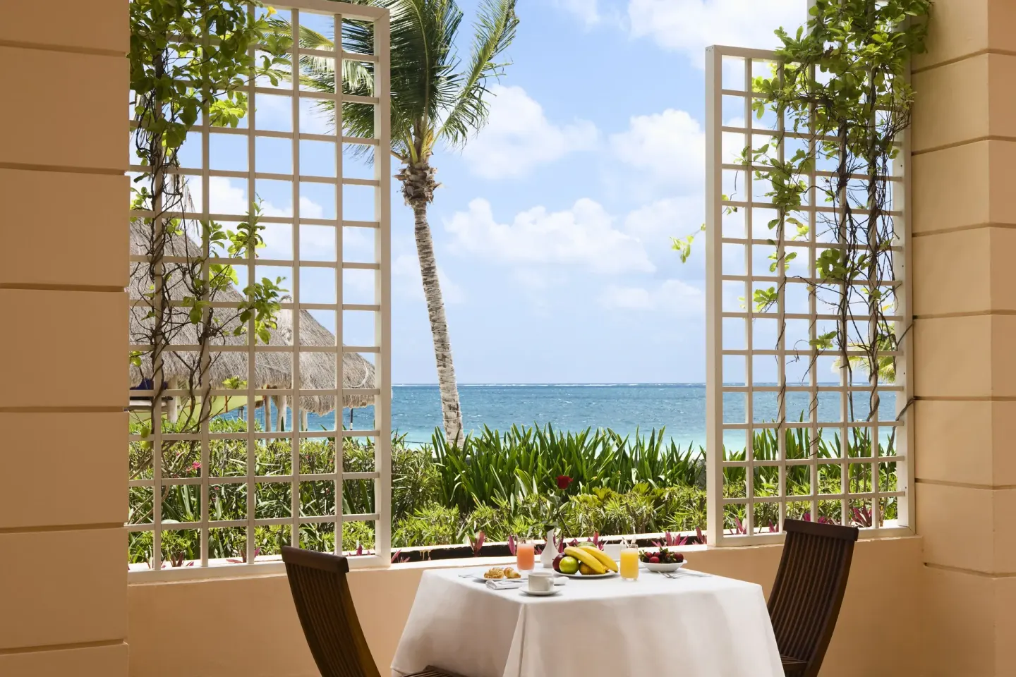 Ocean-view terrace breakfast table at Excellence Riviera Cancun.
