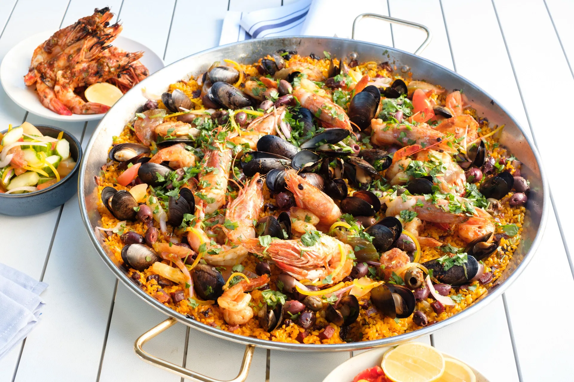 Seafood paella with shrimp, mussels, and grilled prawns at Fairmont El San Juan.