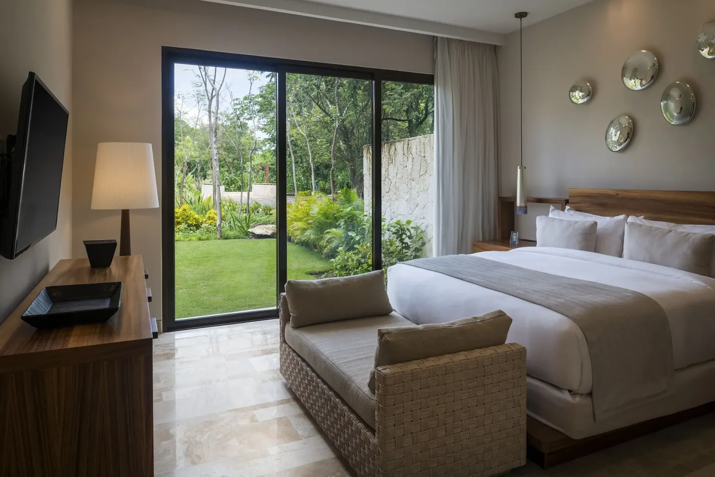 Garden-view king bedroom at Fairmont Heritage Place Mayakoba.