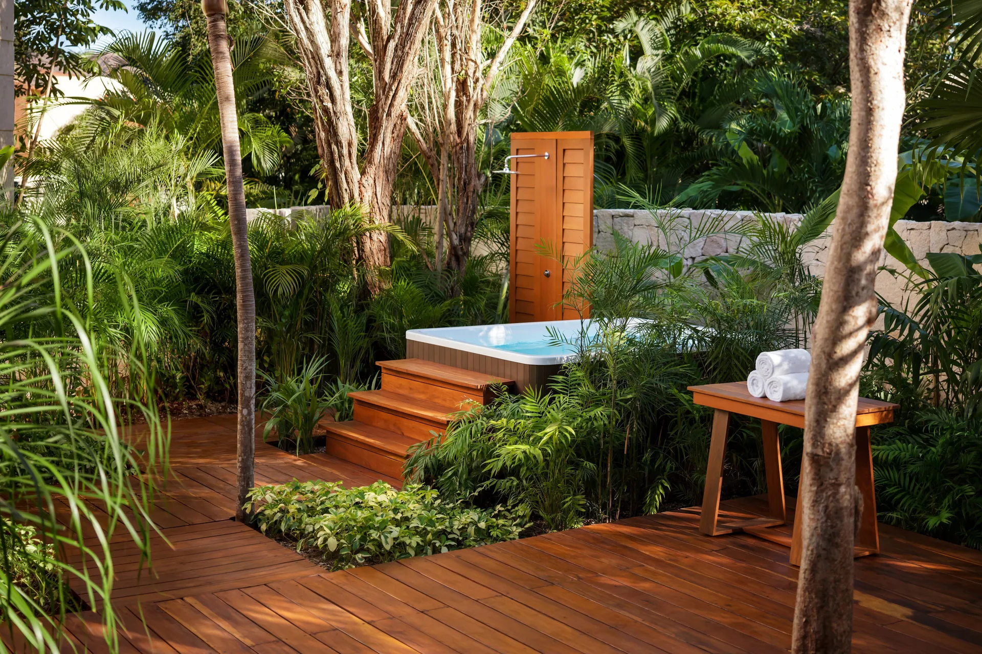 Private outdoor plunge pool set in tropical greenery at Fairmont Heritage Place Mayakoba.