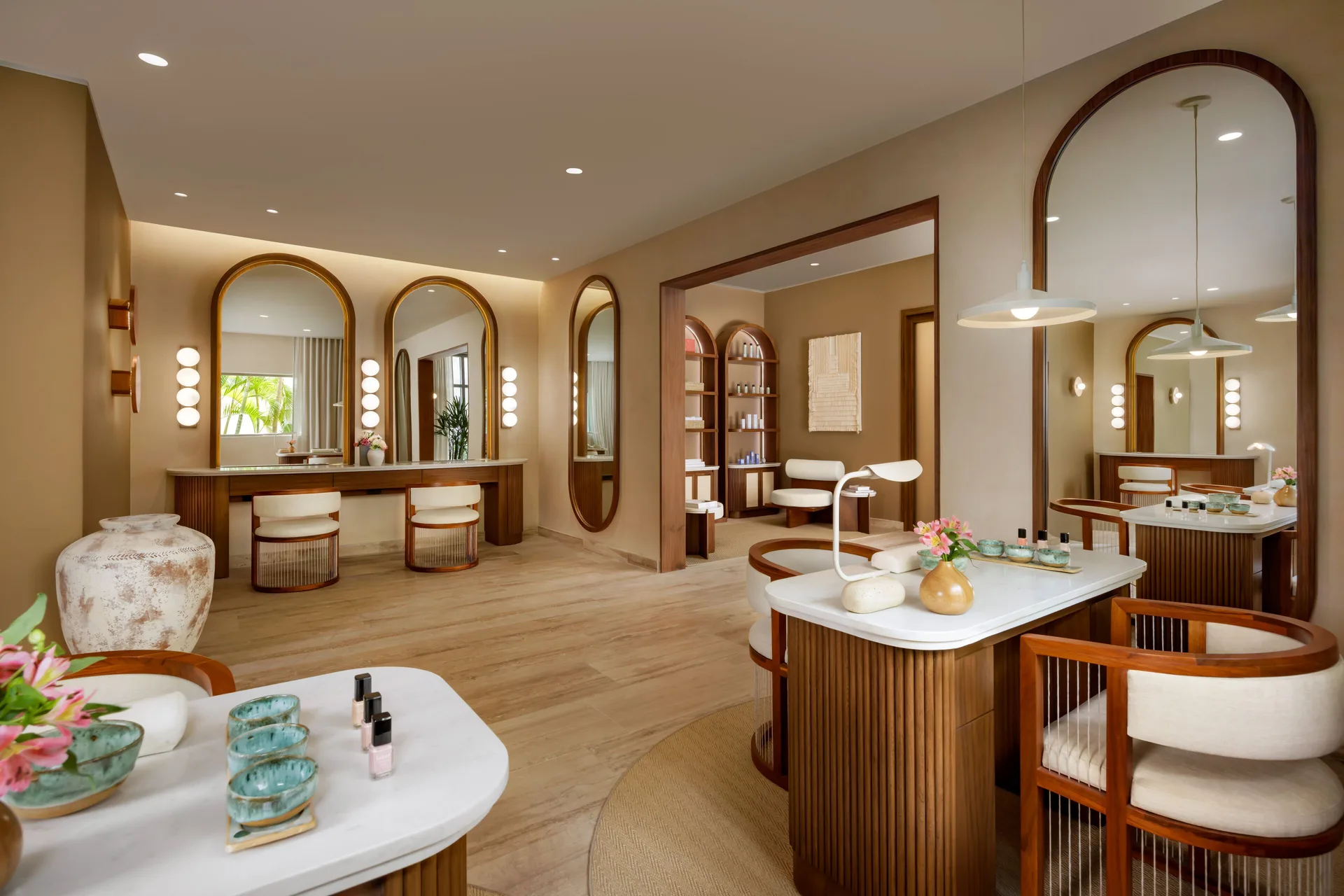 Spa beauty salon with mirrors and manicure tables at Fairmont Heritage Place Mayakoba.