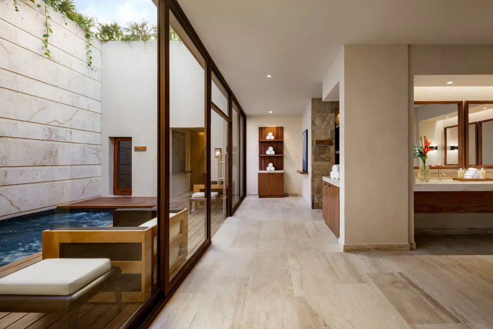 Spa corridor with private plunge pool and vanity at Fairmont Heritage Place Mayakoba.