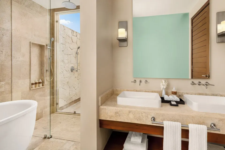 Penthouse villa bathroom with double sinks at Fairmont Heritage Place Mayakoba.