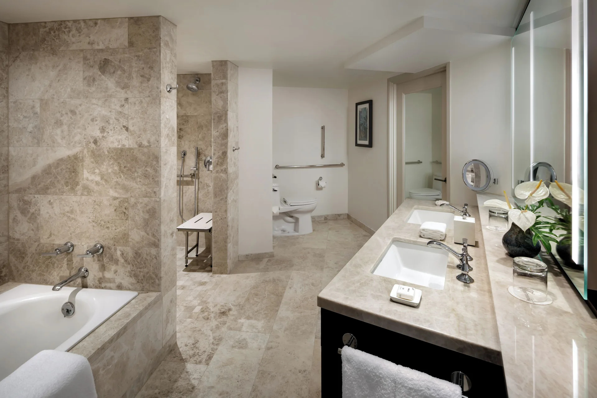 Fairmont Kea Lani Maui accessible bathroom with tub, shower and vanity at Fairmont Kea Lani Maui.