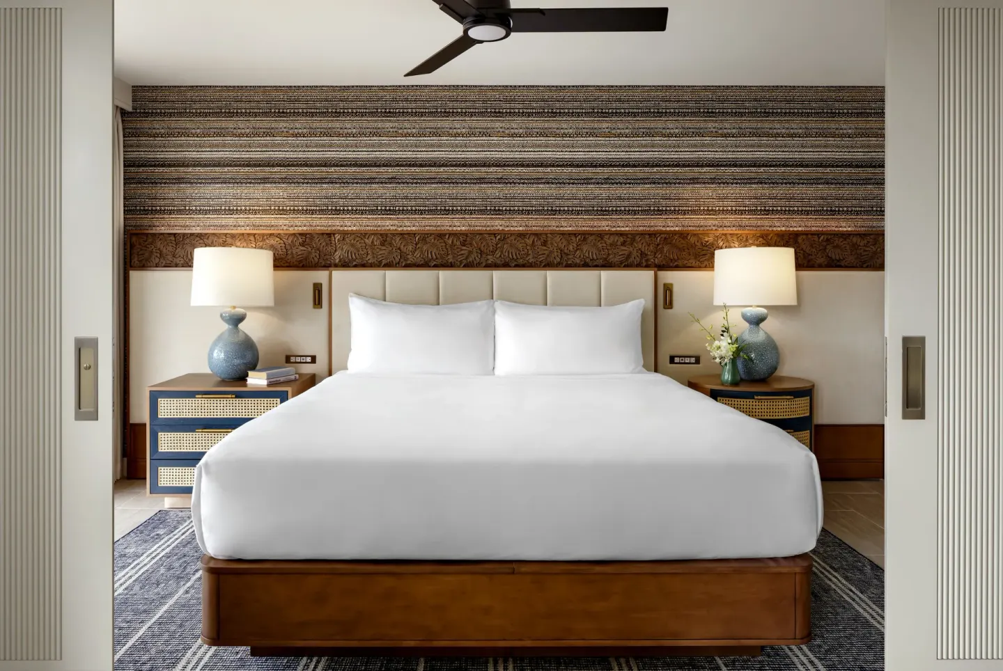 Fairmont Kea Lani Maui bedroom with king bed, nightstands and lamps at Fairmont Kea Lani Maui.