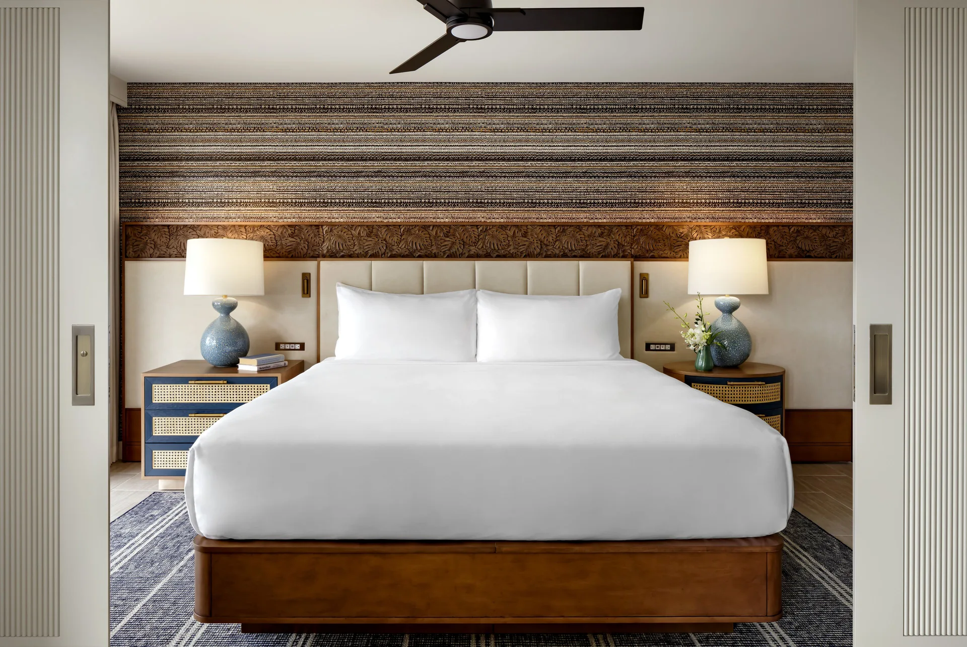 Fairmont Kea Lani Maui bedroom with king bed, nightstands and lamps at Fairmont Kea Lani Maui.