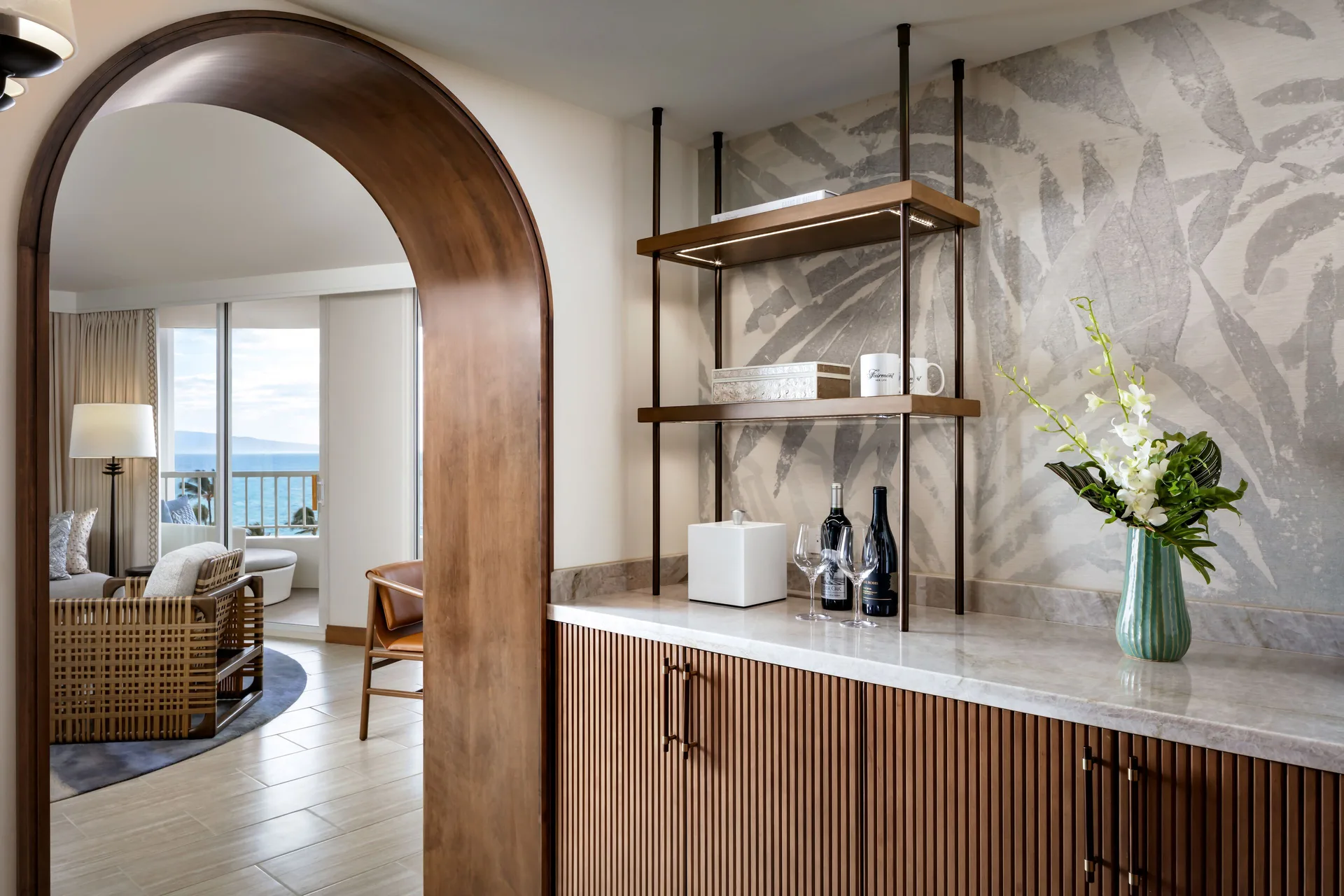 Kilohana Corner Suite refreshment cabinet and archway at Fairmont Kea Lani Maui.
