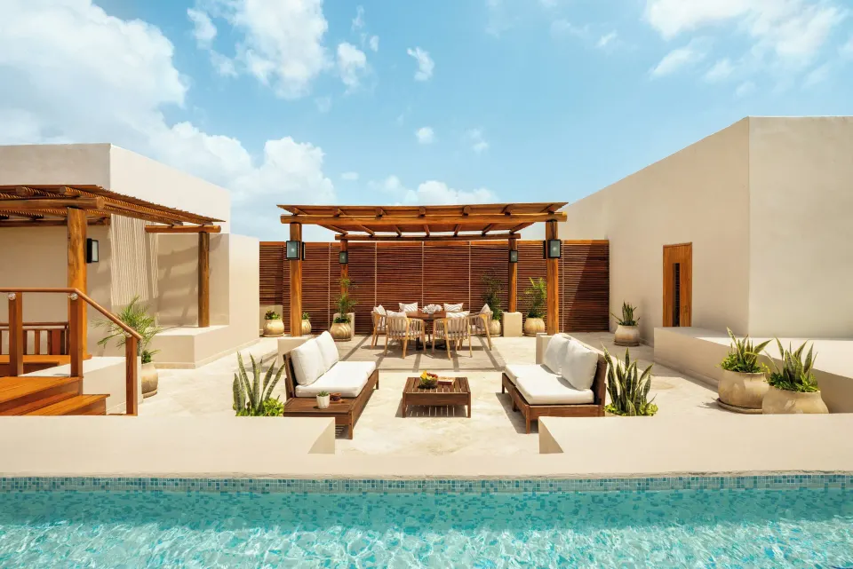 Bambu Suite private pool terrace with loungers and pergola dining at Fairmont Mayakoba.
