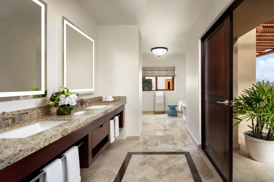Bambu Suite bathroom vanity and terrace doorway at Fairmont Mayakoba.