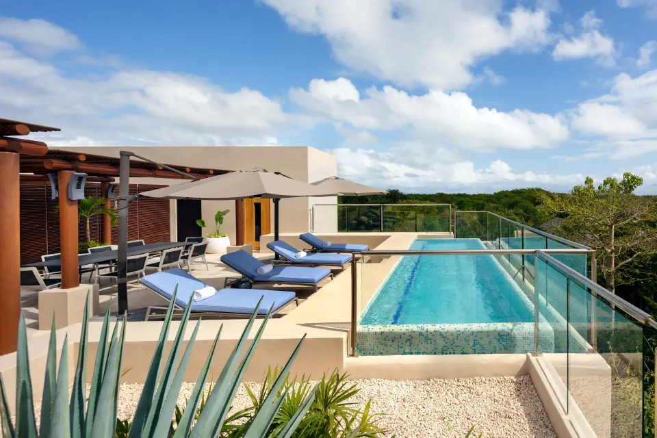 Bambu Suite private pool terrace with loungers at Fairmont Mayakoba.