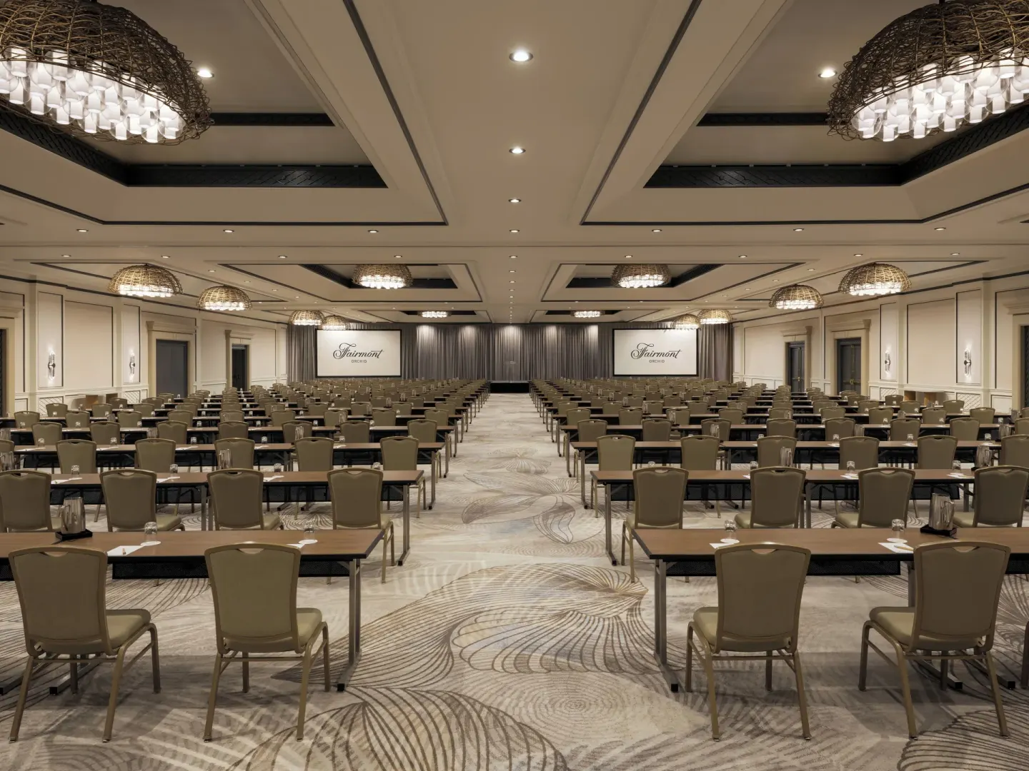 Large conference ballroom set with classroom tables and chairs at Fairmont Orchid.