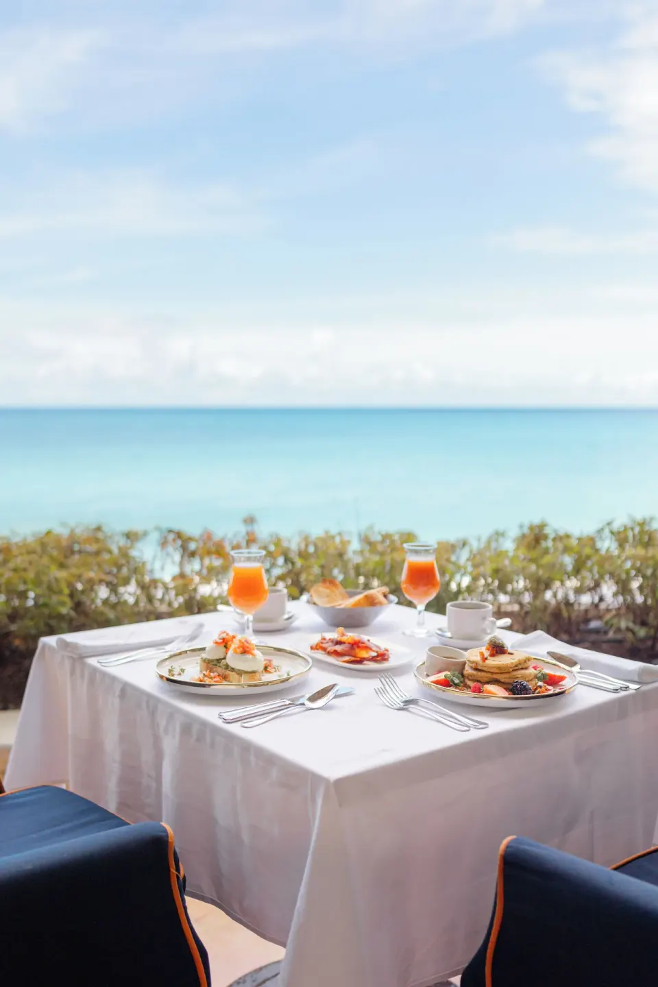 Breakfast table with ocean view at Fairmont Royal Pavilion.