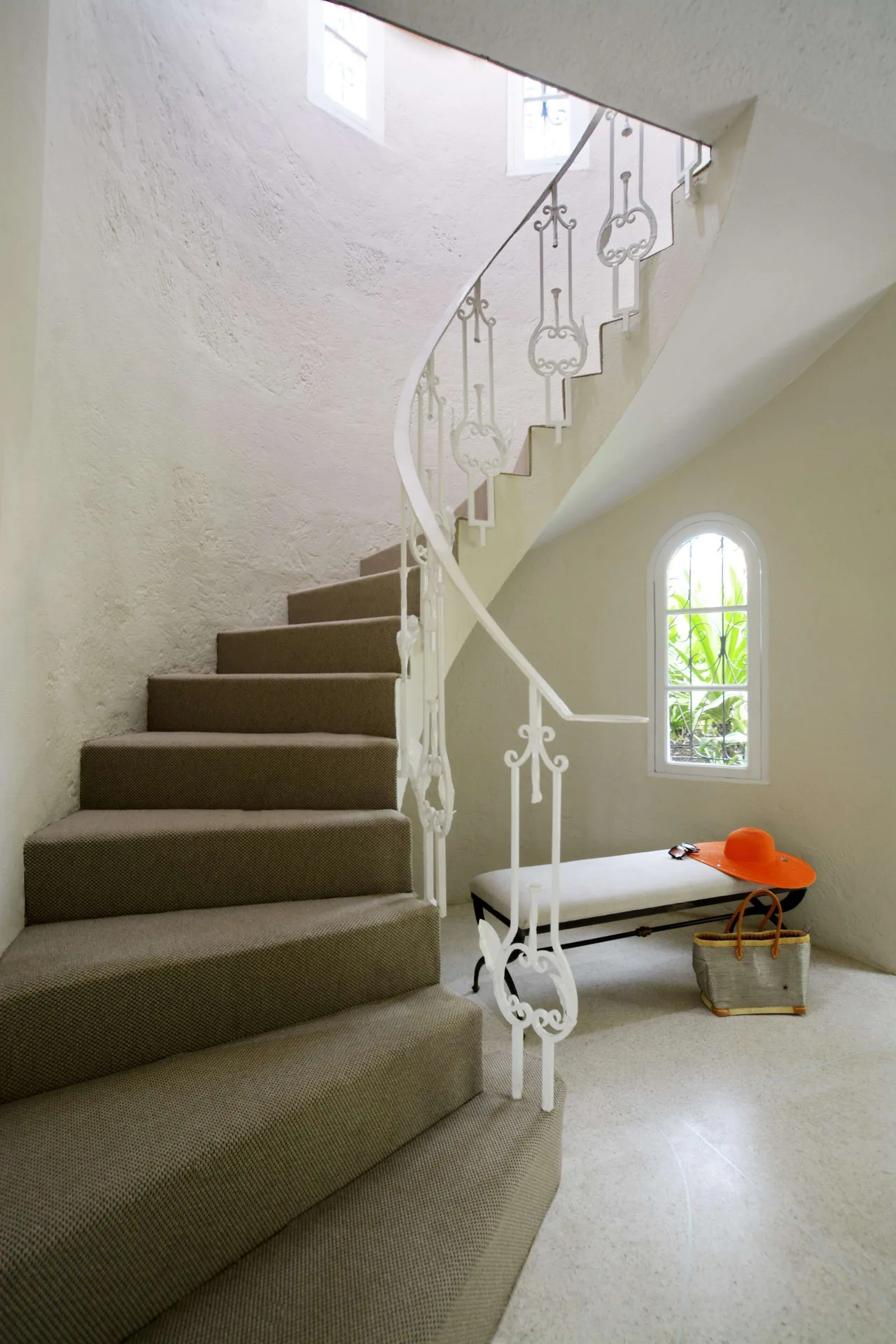 Staircase and bench in a Junior Suite at Fairmont Royal Pavilion.