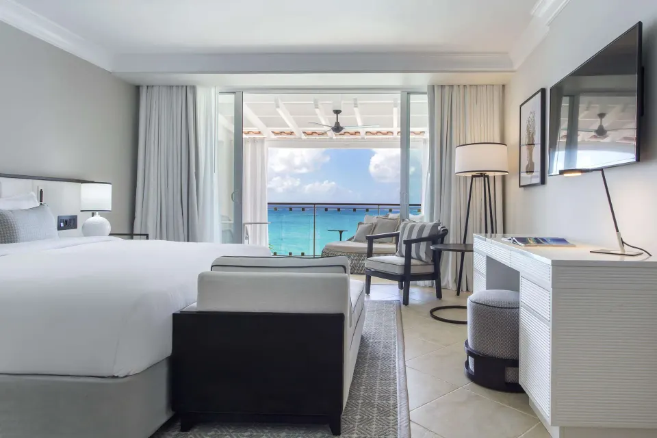 Luxury Room Oceanfront with king bed and balcony sea view at Fairmont Royal Pavilion.