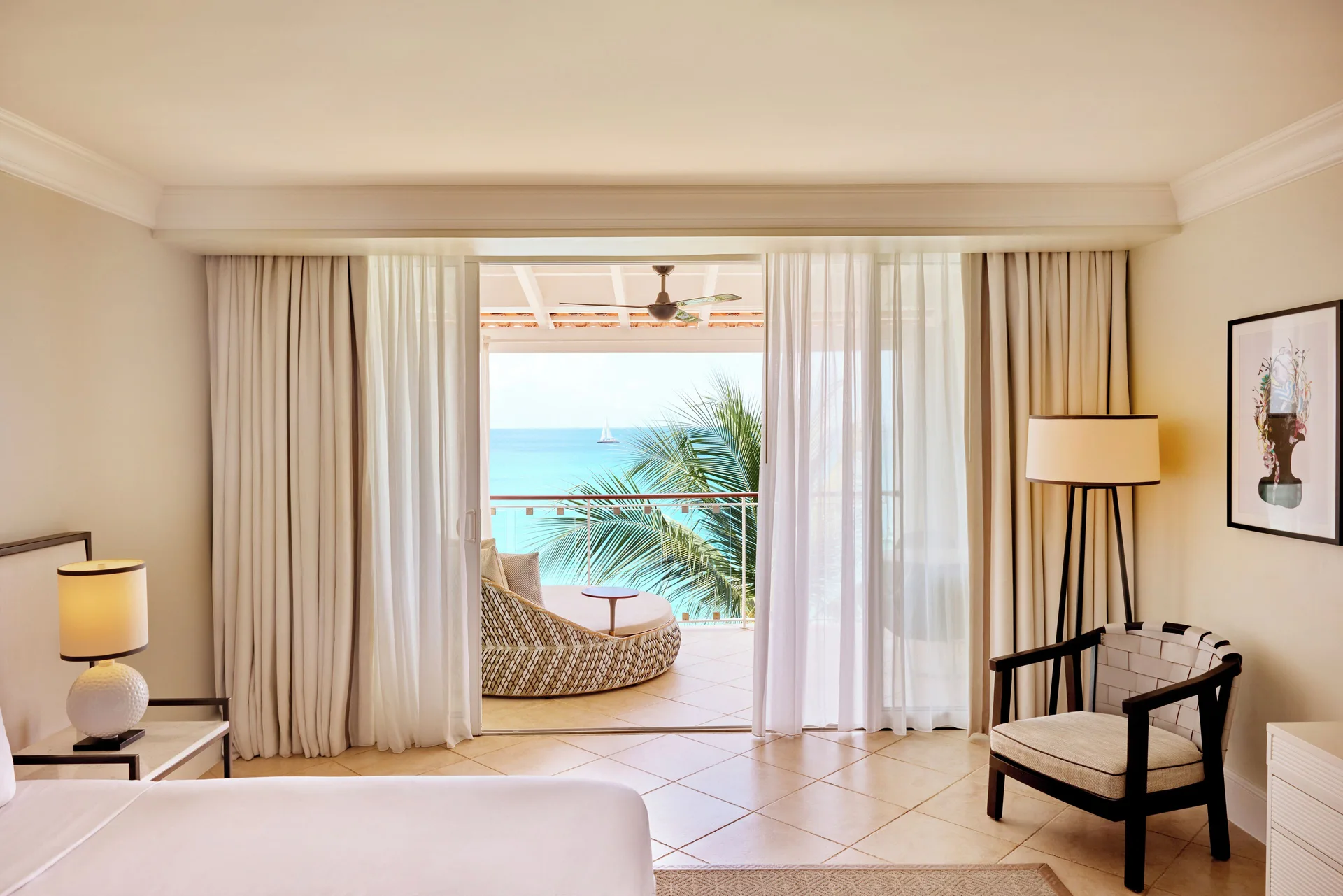 Signature Oceanfront Room at Fairmont Royal Pavilion with king bed and direct Caribbean Sea views from Barbados' Platinum Coast.