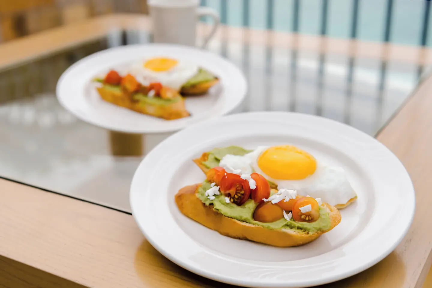 Egg and avocado toast breakfast plates at Fiesta Americana Cancun Villas.