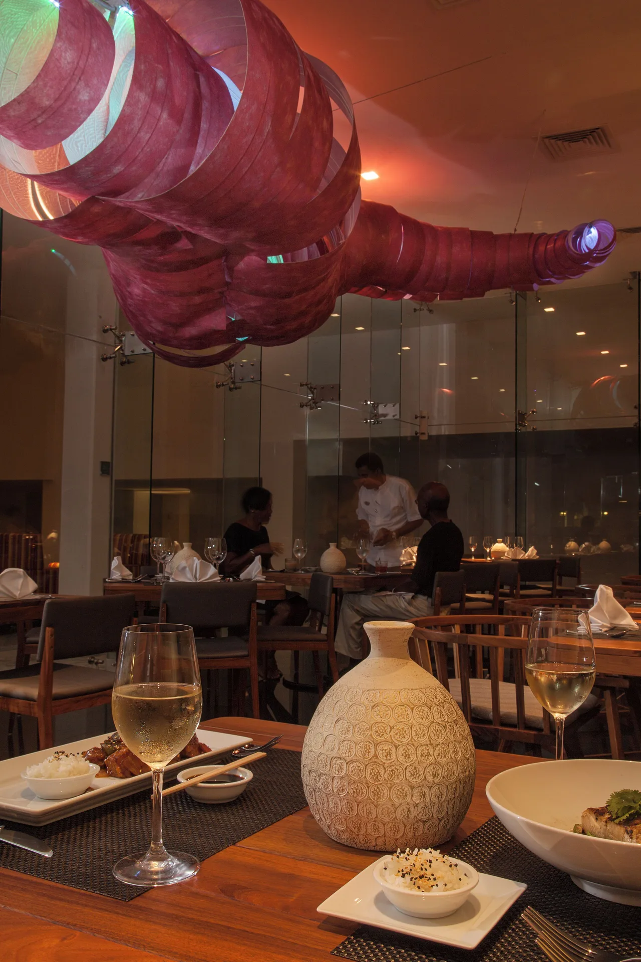 Pan-Asian dining room with table settings at Península, Fiesta Americana Cozumel.