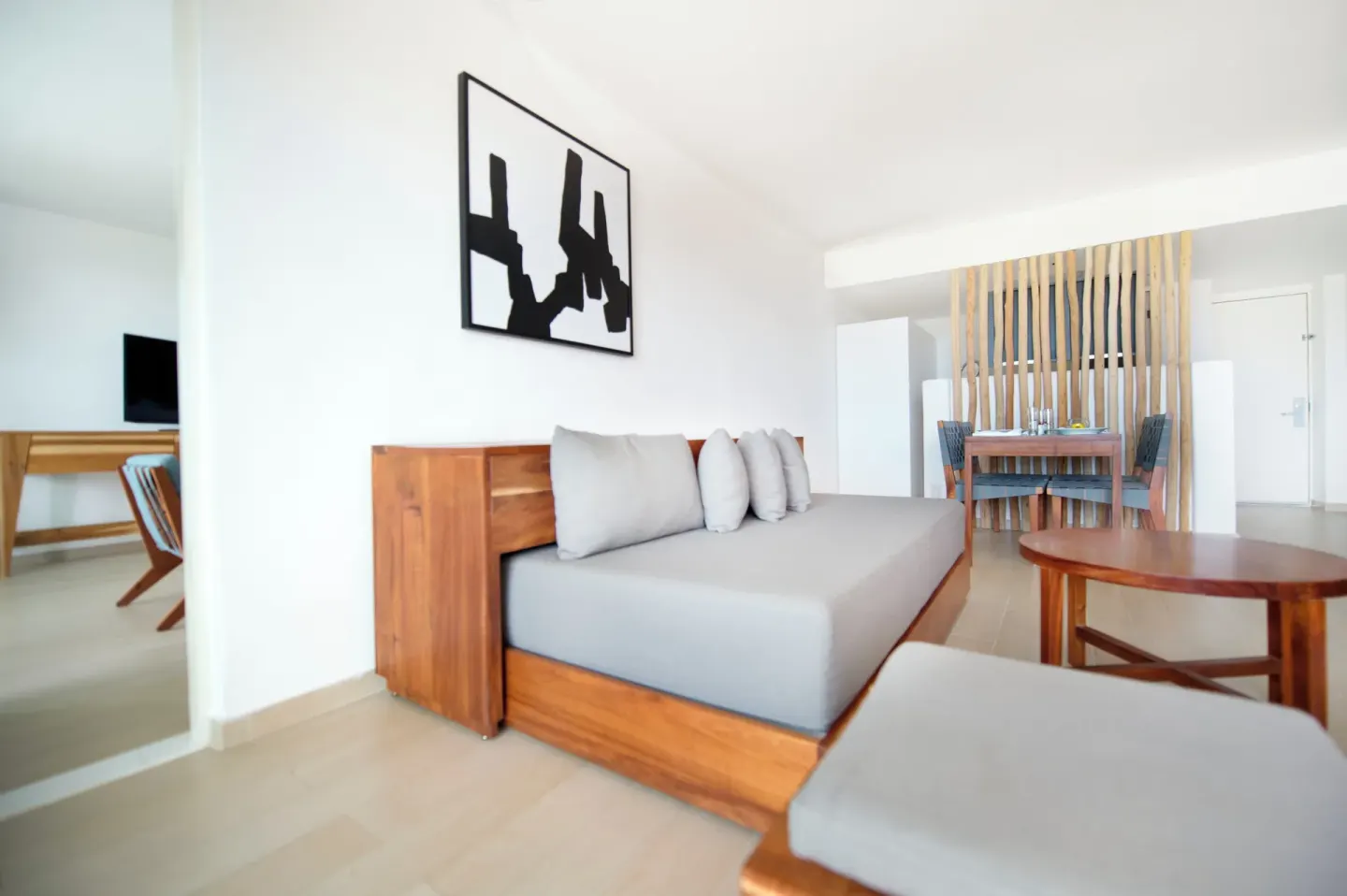 Master Suite living area with daybed and dining table at Fiesta Americana Cozumel.
